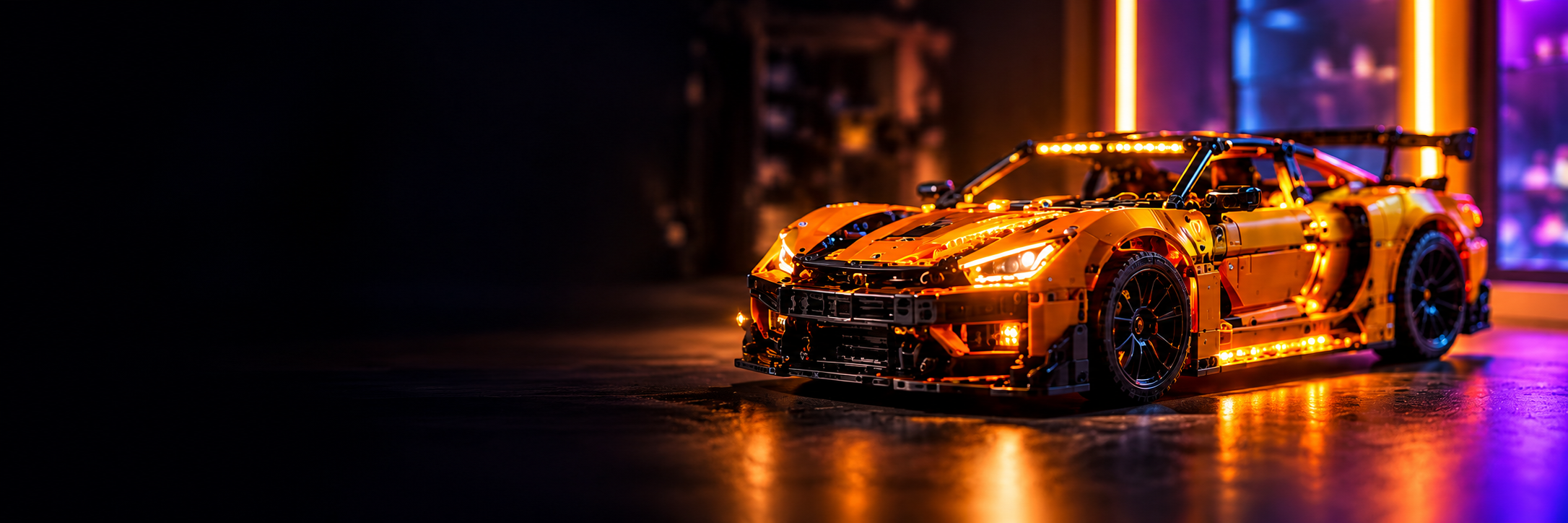 An orange brick-built sports car with glowing headlights